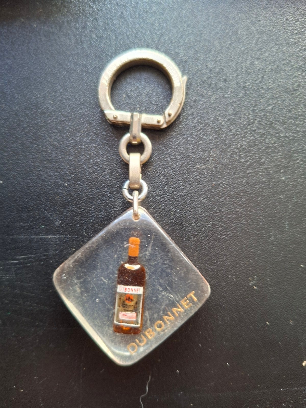 Vintage Dubonnet sleutelhanger, Ophalen of Verzenden, Gebruikt, Overige typen