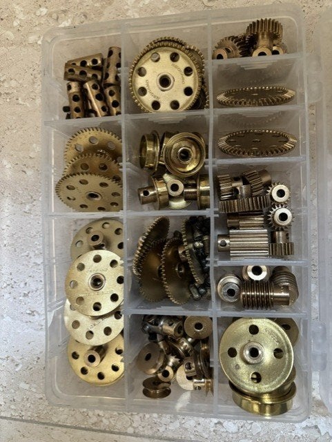 Partij Meccano tandwielen en toebehoren in nieuwstaat, Antiek en Kunst, Ophalen of Verzenden