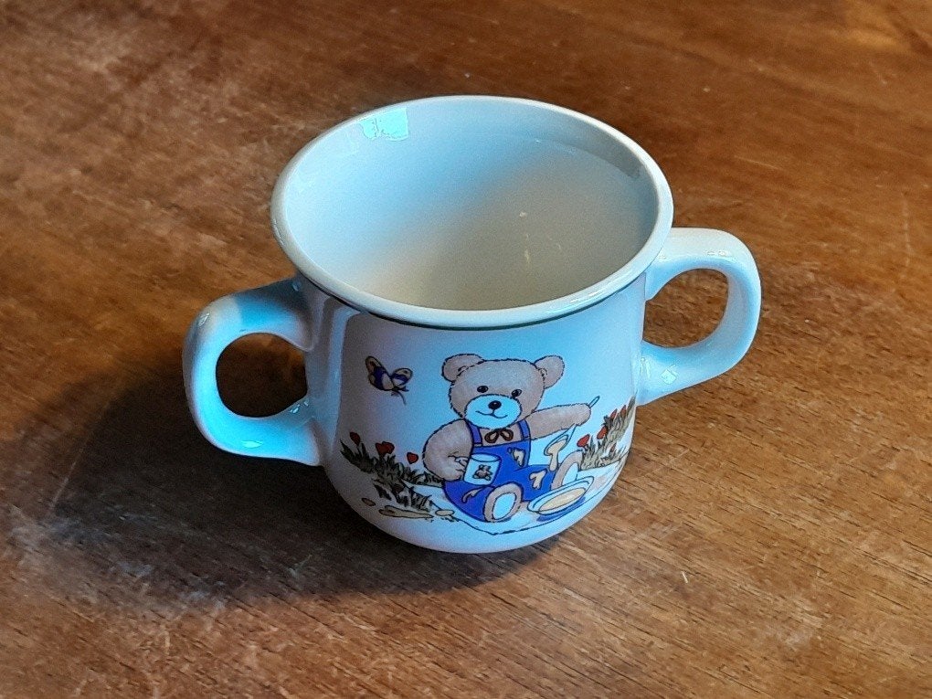 Kinderbeker 2 oren met afbeelding van beer, Gebruikt, Ophalen of Verzenden, Overige stijlen, Kop(pen) en/of Schotel(s)