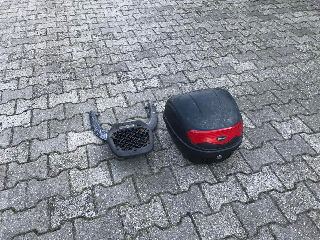 Scooter koffer, Ophalen