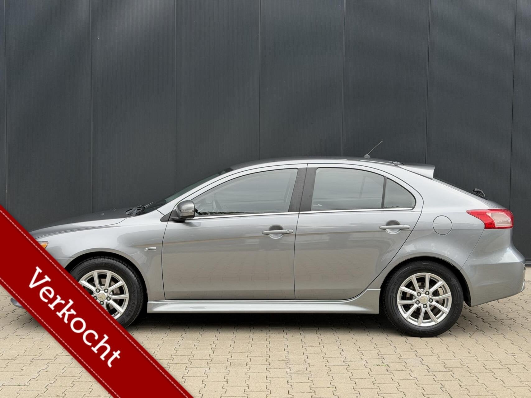 Mitsubishi Lancer Sportback 1.6 Limited Edition Trekhaak PDC, Auto's, Voorwielaandrijving, Stof, Gebruikt, 4 cilinders