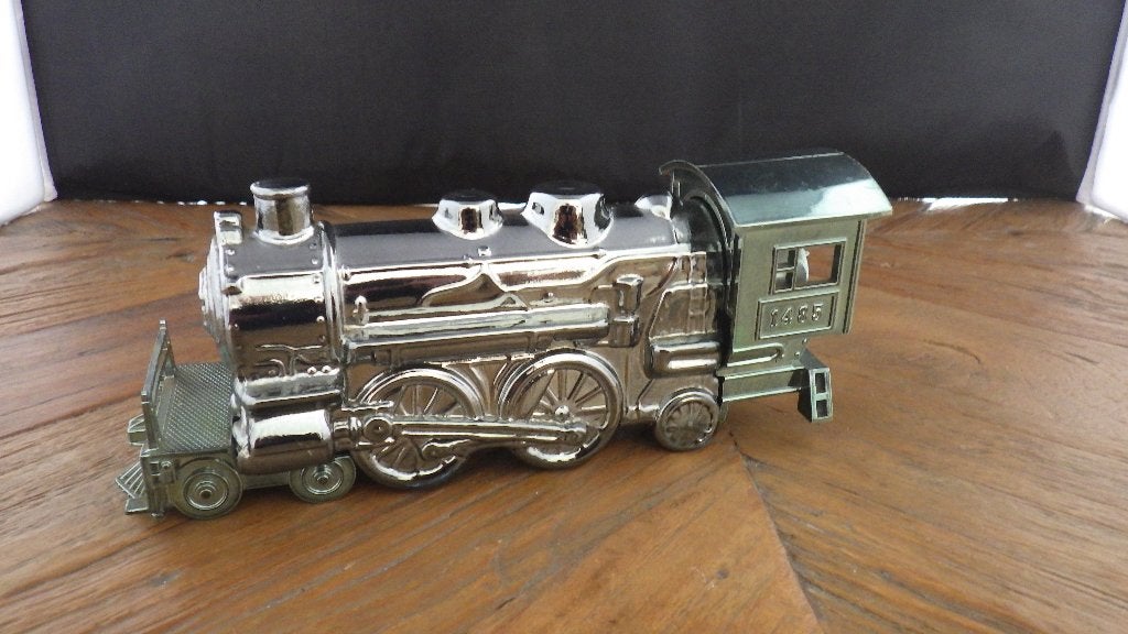 mooie Avon parfumfles in de vorm van een zilveren trein, Ophalen of Verzenden, Huis en Inrichting