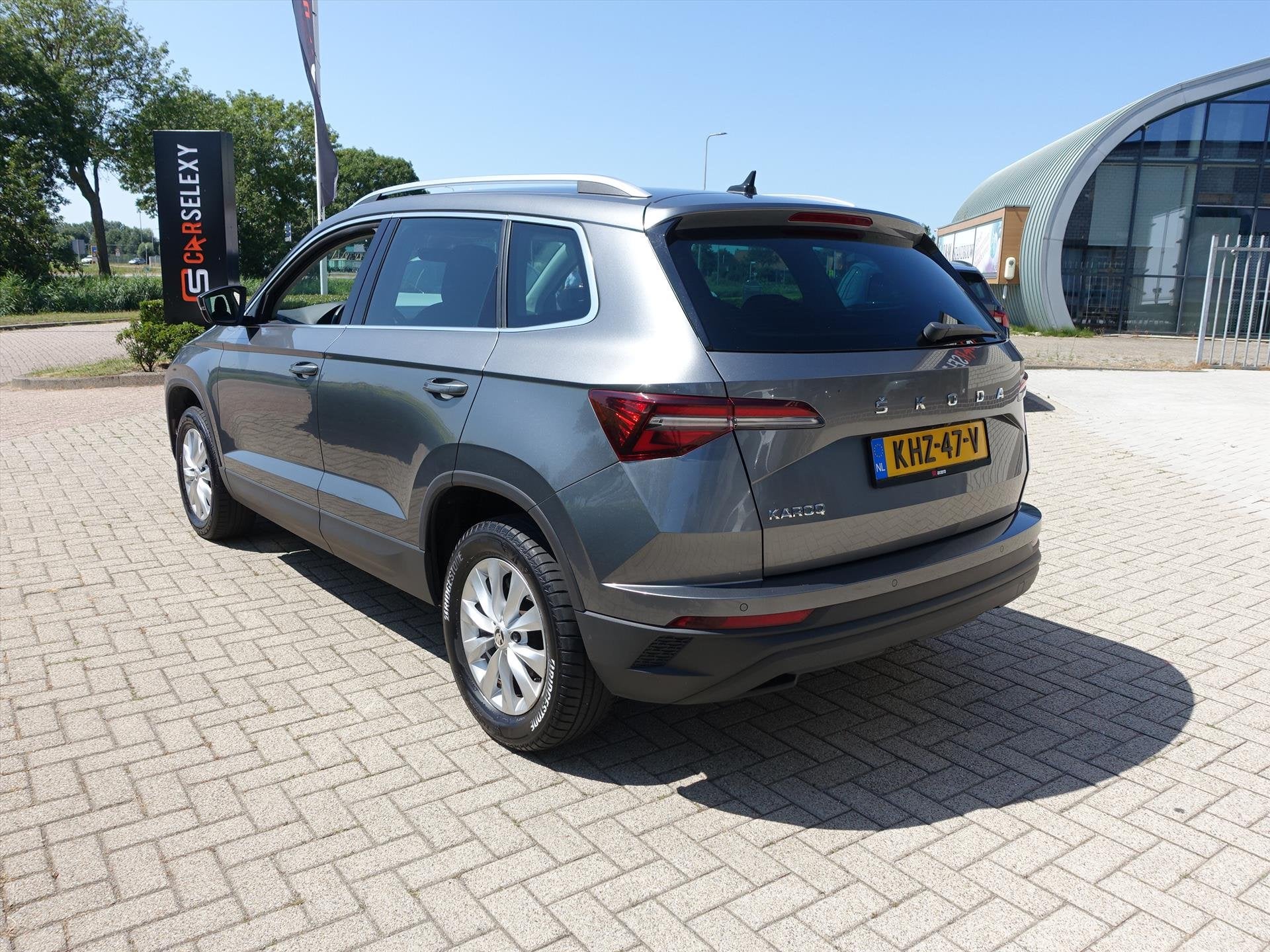 SKODA Karoq 1.5 TSI ACT Greentech 150pk Ambition Business, Auto's, 4 cilinders, Parkeersensor, Karoq, Bedrijf