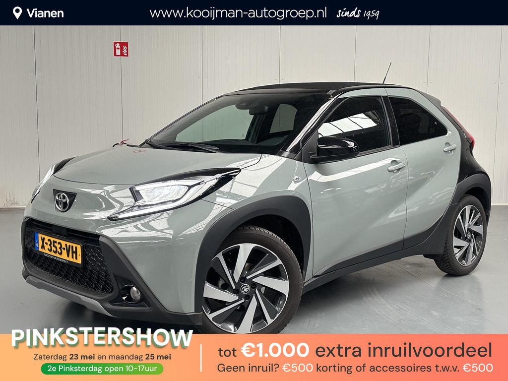 Toyota Aygo X 1.0 VVT-i MT Envy + Cabriodak, 1e eigenaar NL, Auto's, Toyota, Gebruikt, Cabriolet, 4 stoelen, Leder en Stof