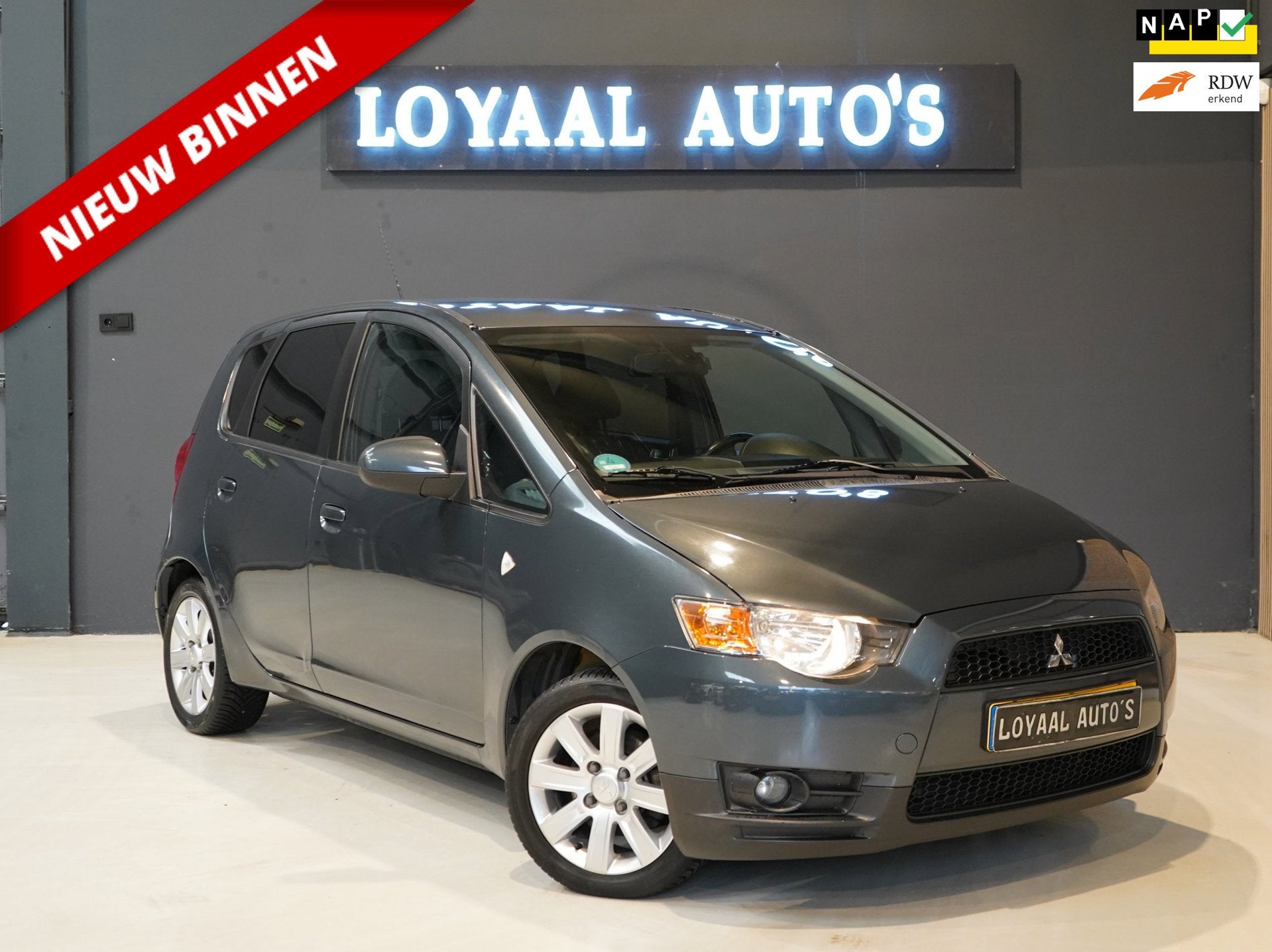 Mitsubishi Colt 1.3 Edition Two | AUTOMAAT | ACHTERUITRIJC., Auto's, Stof, Gebruikt, 31 €/maand, Colt