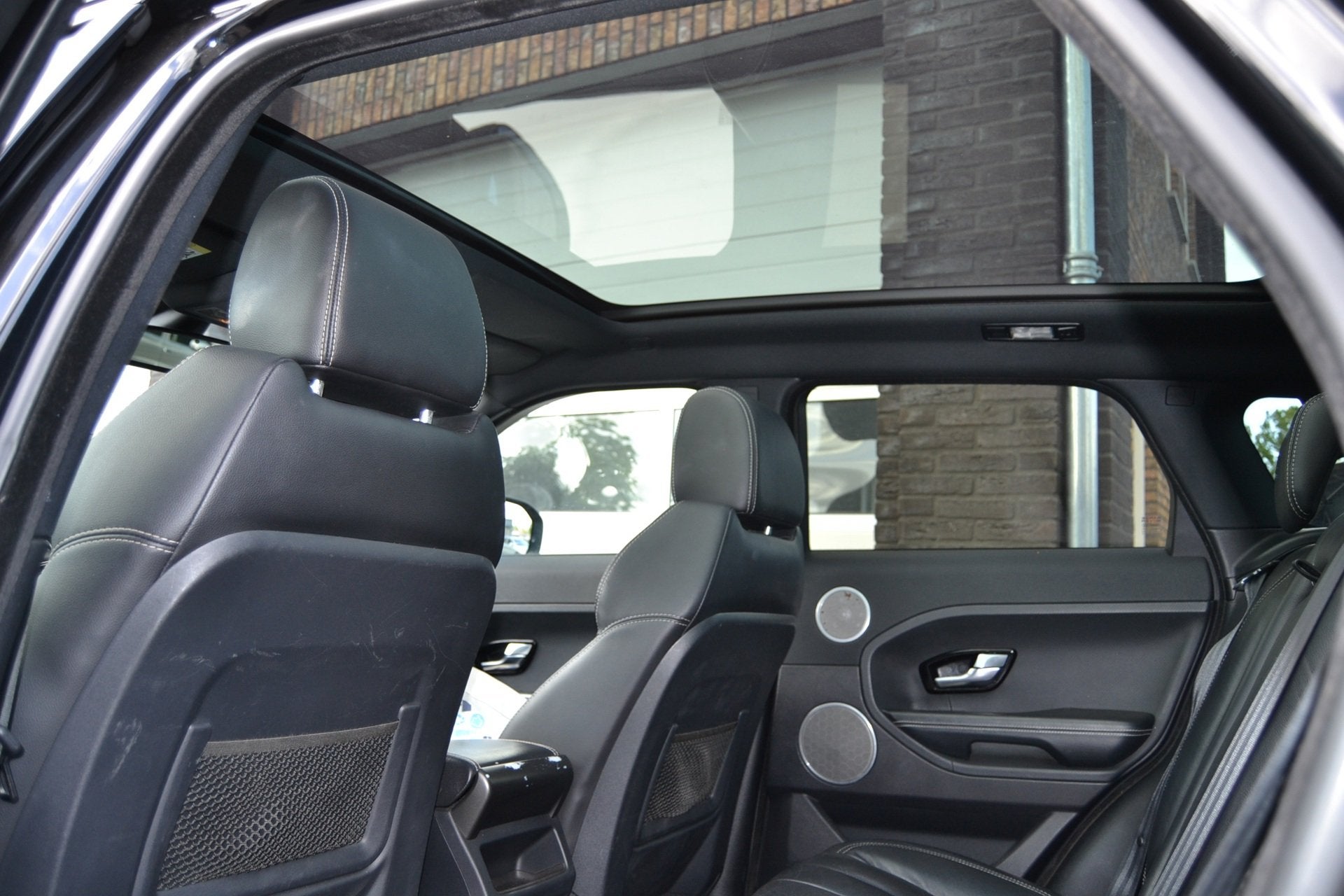 Land Rover Range Rover Evoque 2.0 Si 4WD Prestige, Auto's, Automaat, Euro 5, Zwart, 4 cilinders