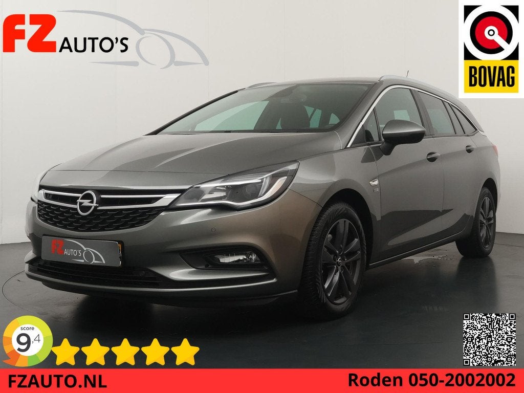 Opel Astra Sports Tourer 1.0 Turbo 120 Jaar Edition - Naviga, Stof, Gebruikt, 1178 kg, 620 kg