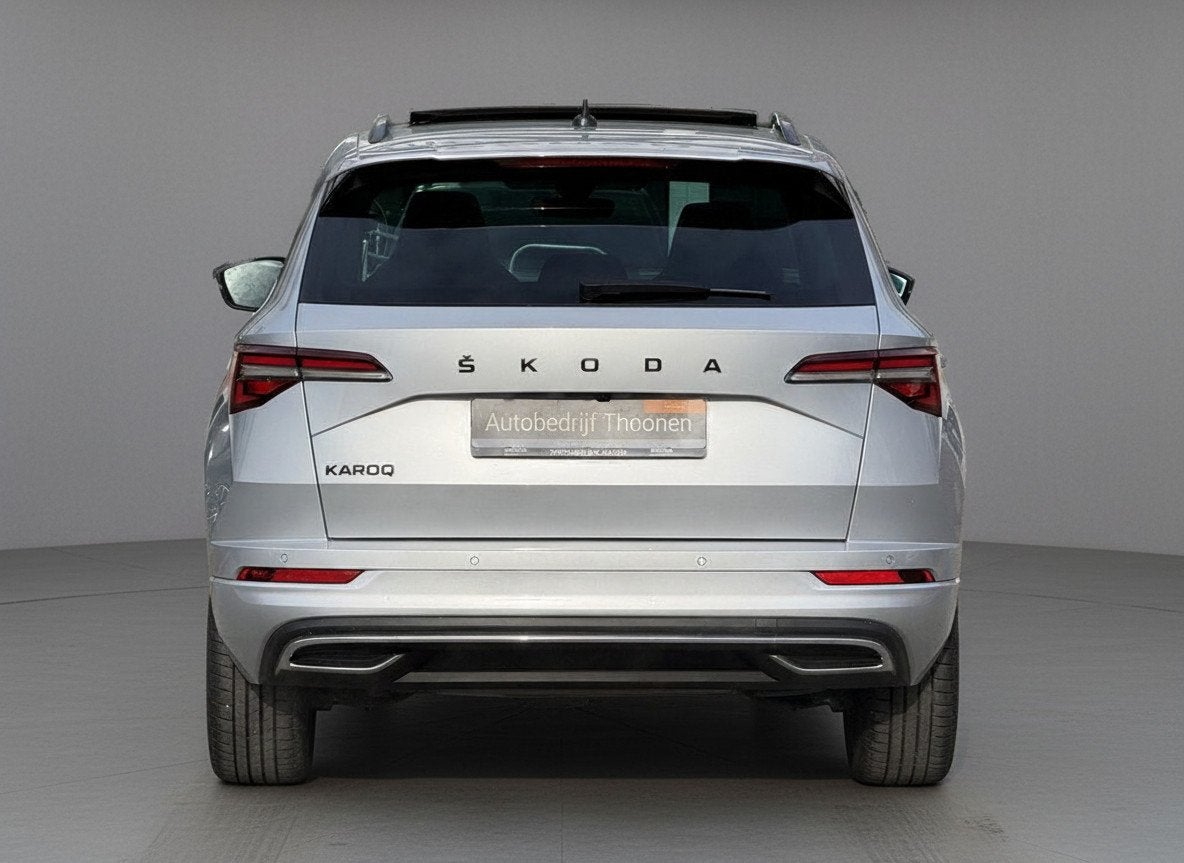 Skoda Karoq 1.5 TSI ACT Sportline Business Trekhaak | Camera, Auto's, Dealer onderhouden, Stof, 4 cilinders, 1317 kg