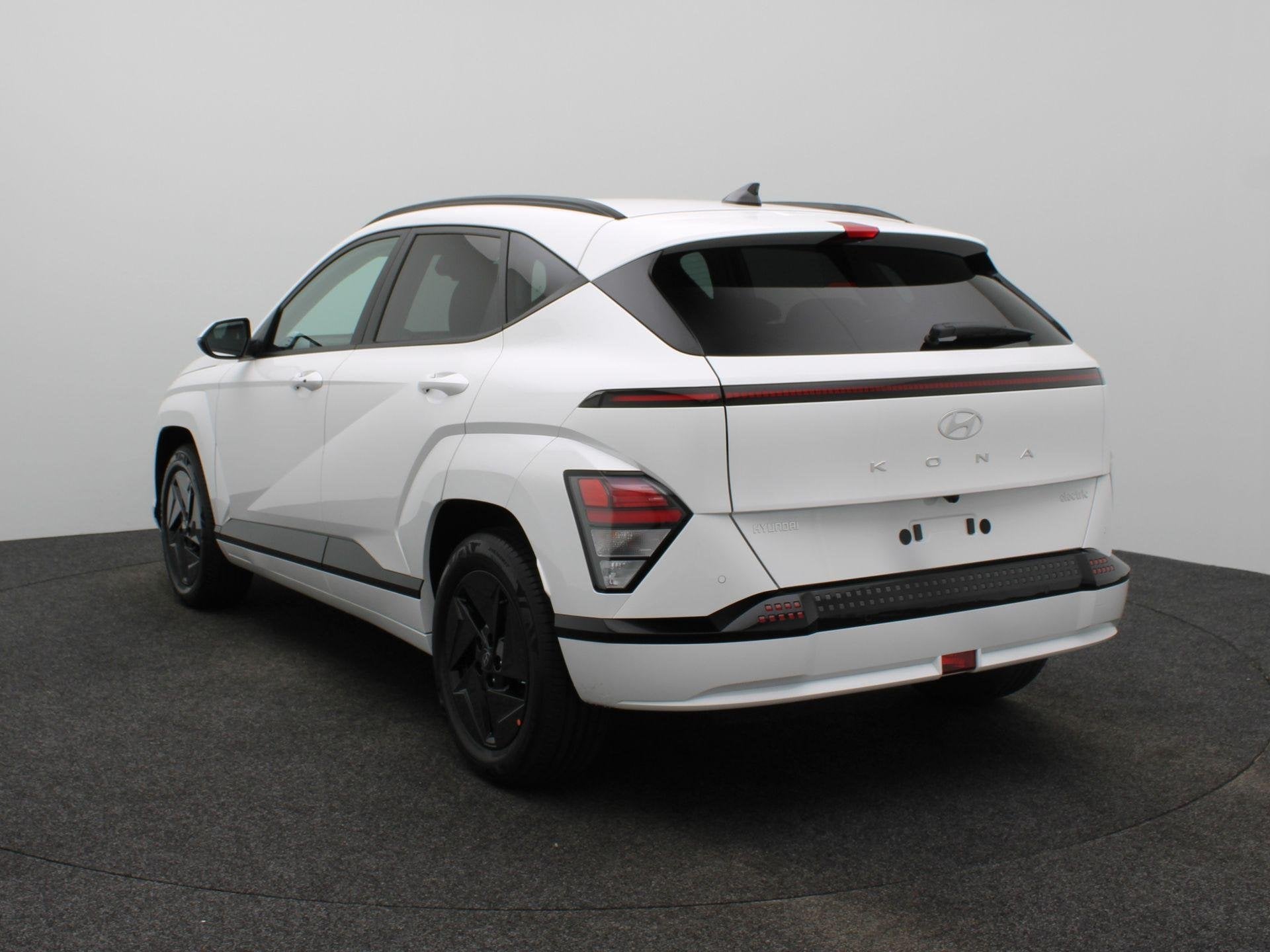 Hyundai Kona Electric Long Range Pure Edition 64.8 kWh | Sto, Stof, Zwart, Met garantie (alle), Wit