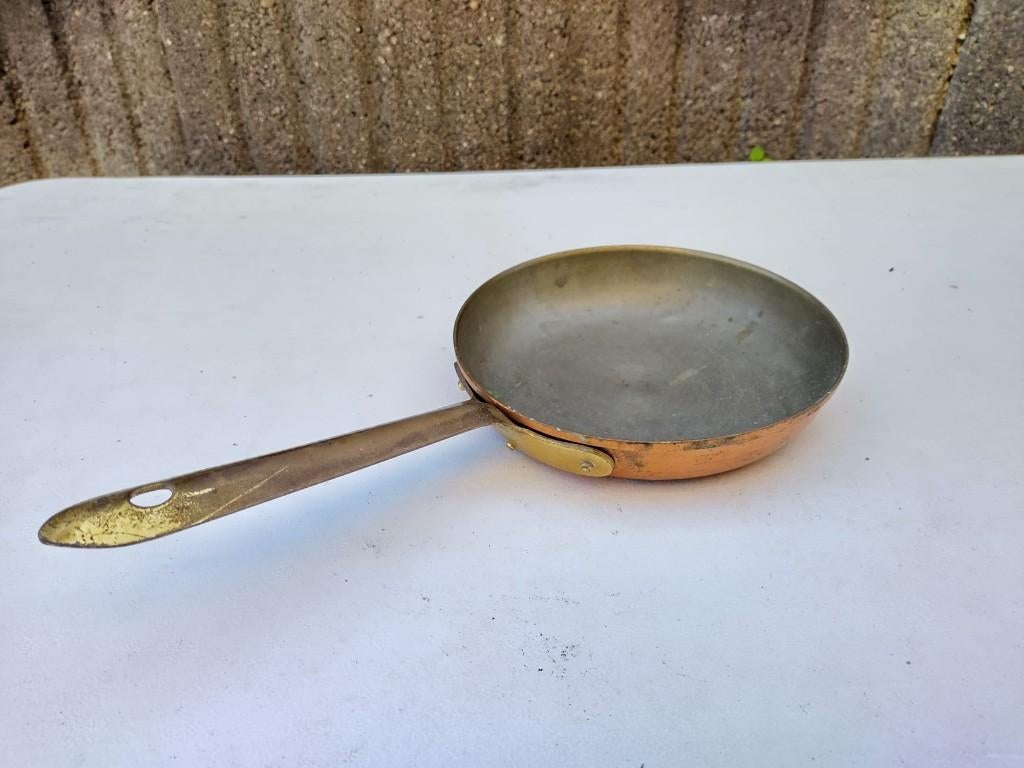 Koperen pan (met messing), Ophalen