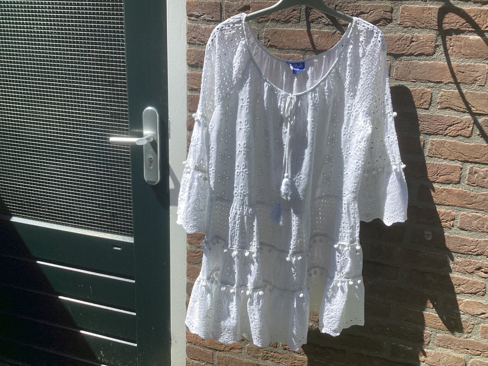 Prachtige witte kanten tuniekjurk met pompons broderie, Ophalen of Verzenden, Zo goed als nieuw, Maat 38/40 (M), Wit