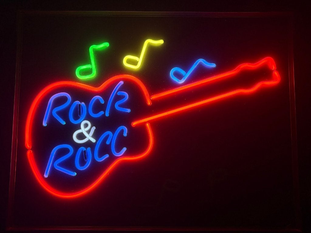 Echte neon reclame Rock & Roll gitaar met bewegende noten