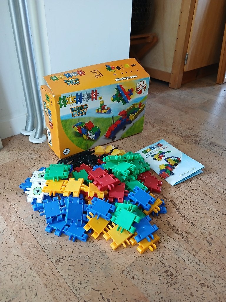 Doos bouwstenen clics clicks + boekje compl wielen 100 delig, Ophalen of Verzenden, Zo goed als nieuw, Overige merken