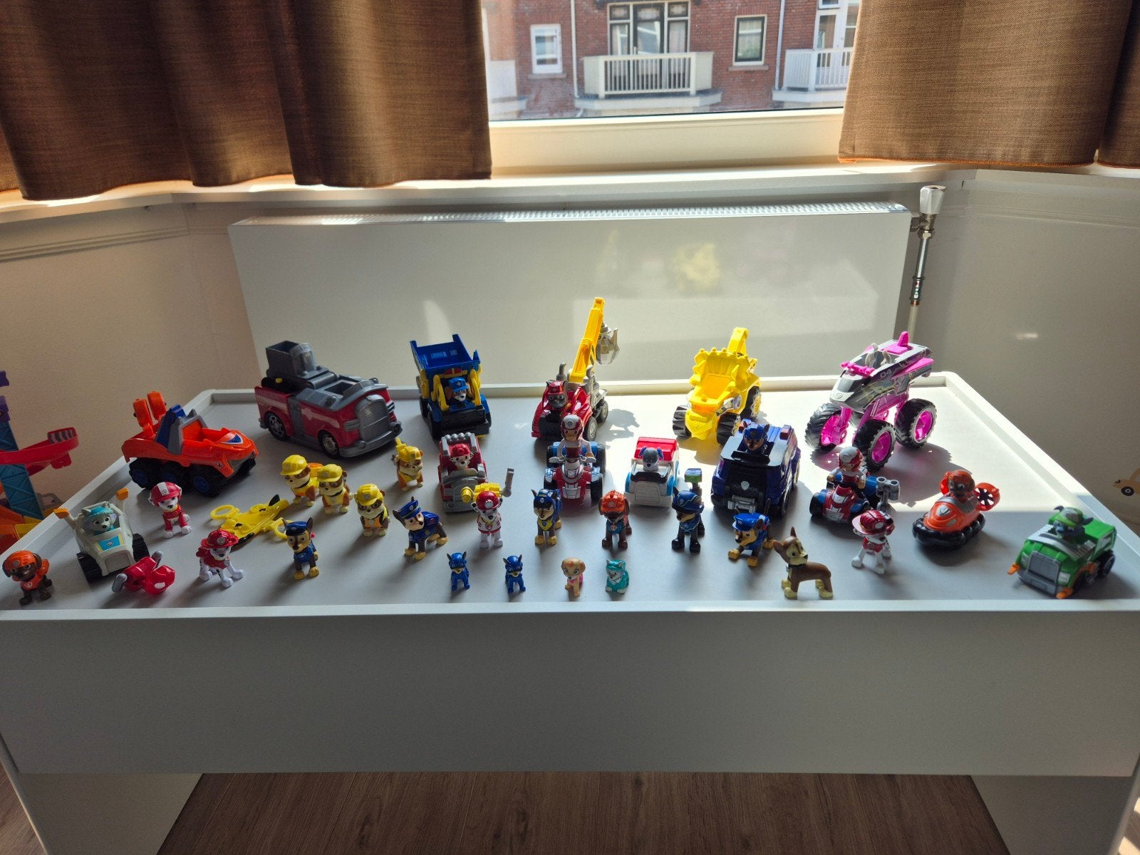 In een koop: Paw Patrol collectie met voertuigen en fi, Ophalen of Verzenden, Gebruikt
