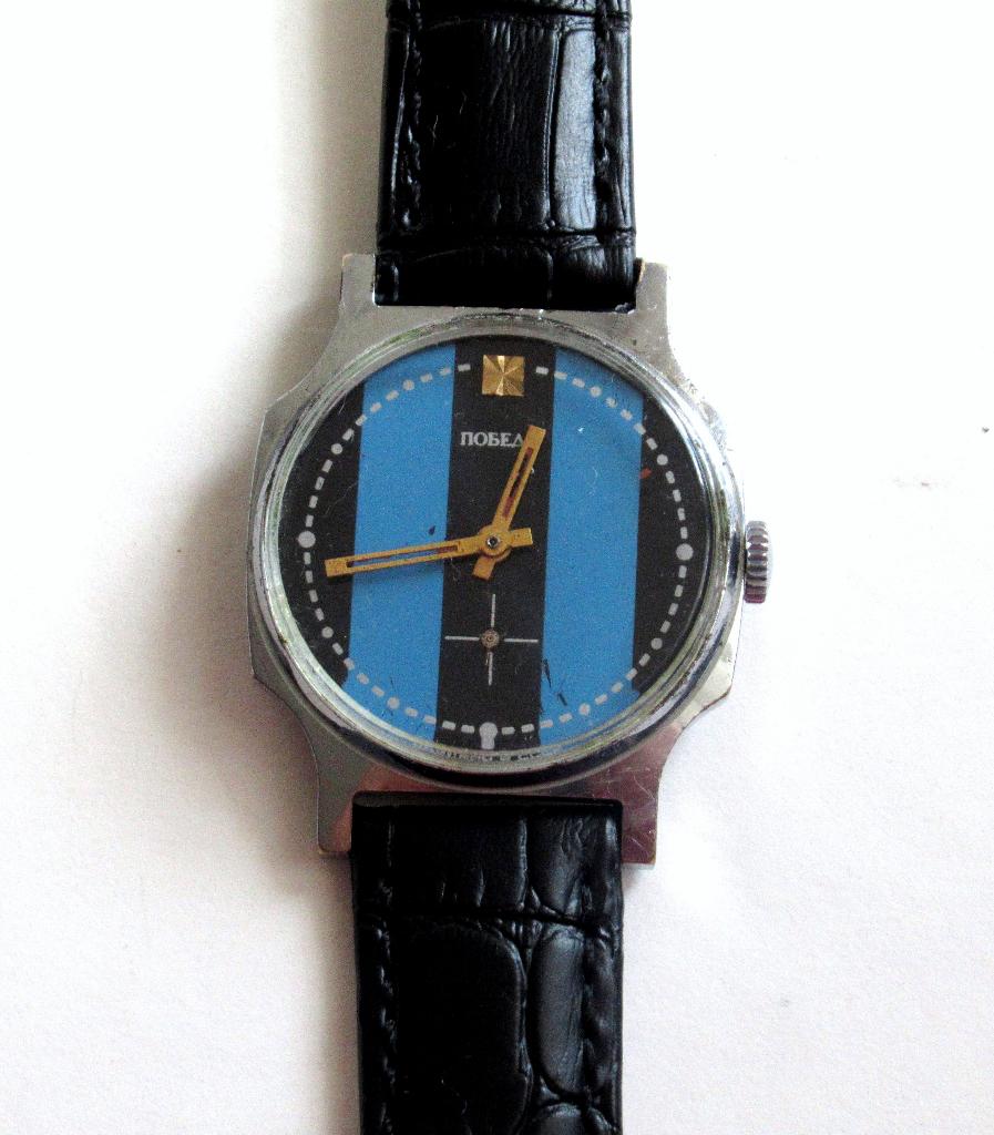 POBEDA vintage Inter Milan mechanisch herenhorloge van '80, Ophalen of Verzenden, Gebruikt, Leer, Overige merken