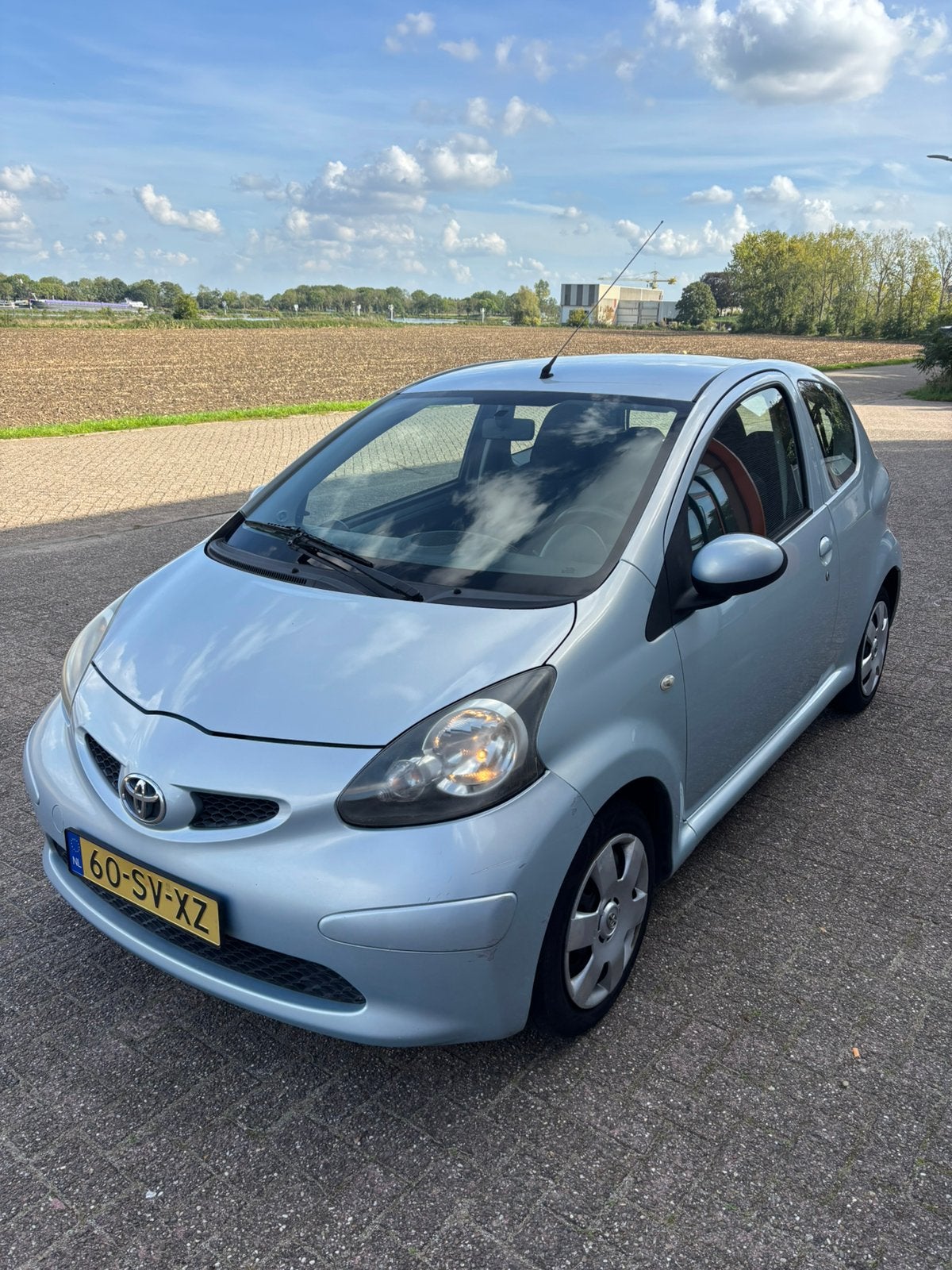 Toyota Aygo 1.0 12V Vvt-i 3DRS MMT 2006 Blauw, Auto's, Voorwielaandrijving, 68 pk, Origineel Nederlands, Handgeschakeld