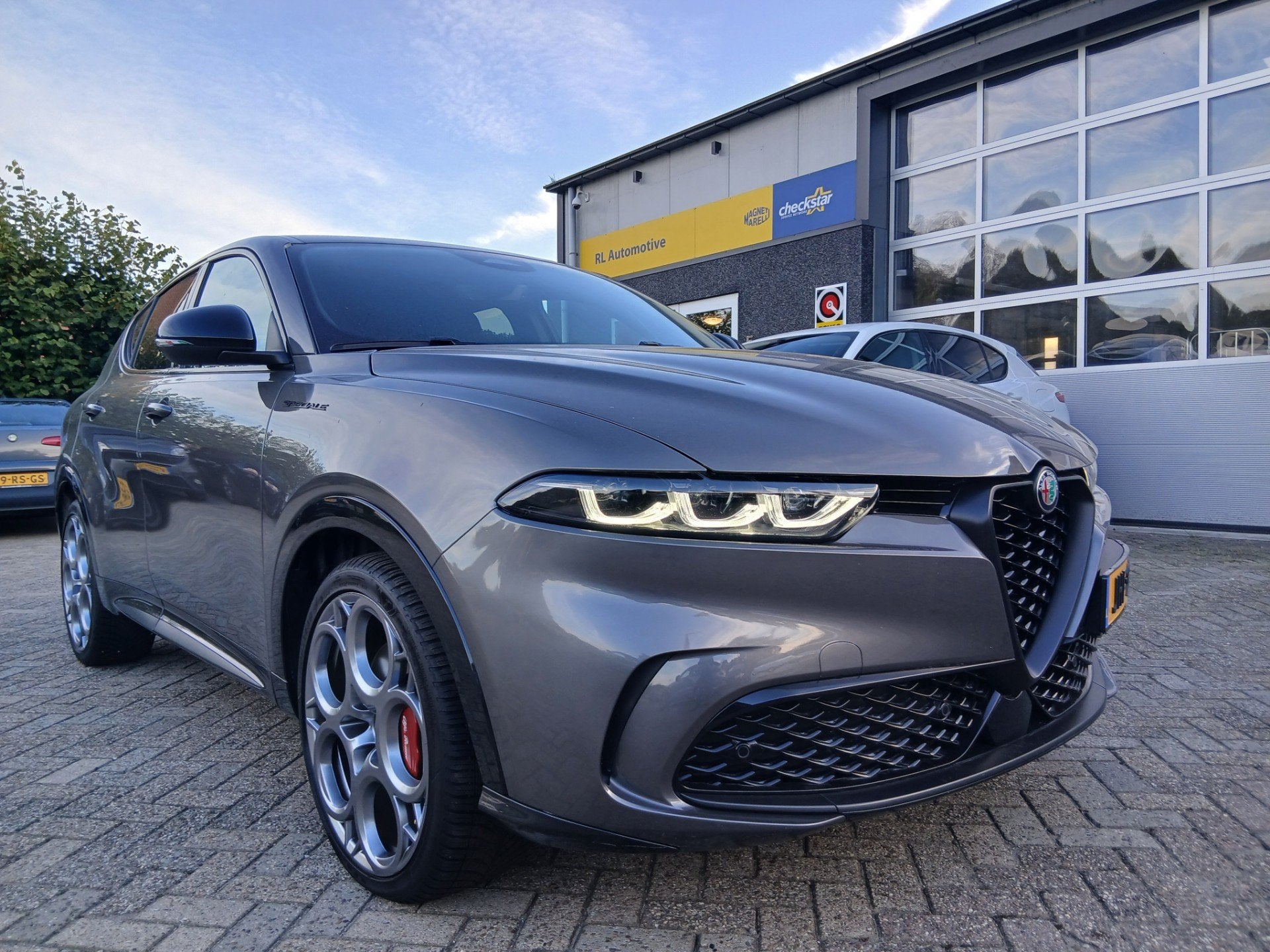 Alfa Romeo TONALE 1.5T Hybrid Edizione Speciale - Trekhaak -, Auto's, Dealer onderhouden, Gebruikt, 4 cilinders, 700 kg
