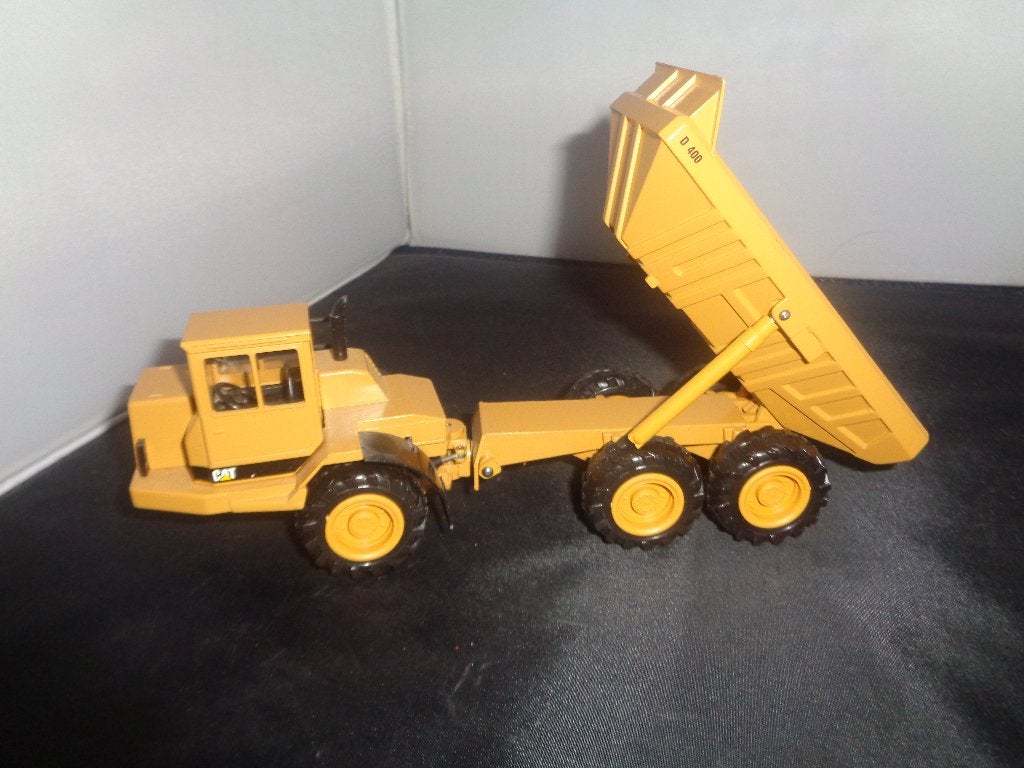 Conrad caterpillar D400 dumper, Hobby en Vrije tijd, Modelauto's | 1:50, Zo goed als nieuw, Hijskraan, Tractor of Landbouw, Conrad