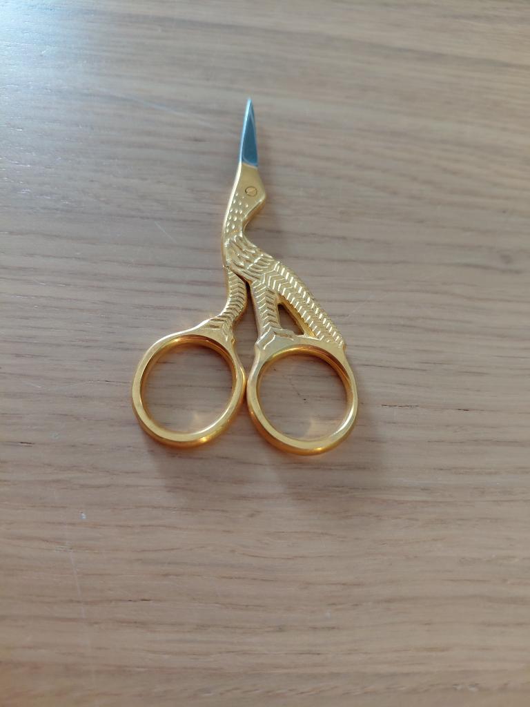 schaartje ooievaar goudkleurig, Ophalen of Verzenden