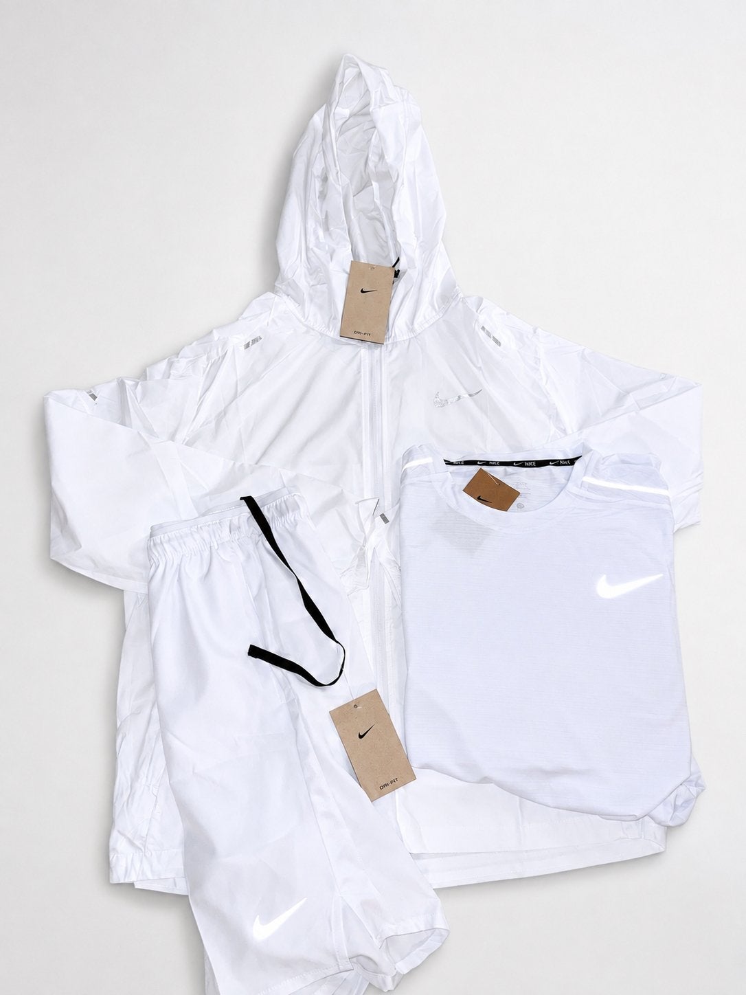 Nike Miller Reflectieve jas, T-shirt en korte broek (wit), Maat 52/54 (L), Wit, Nike, Nieuw