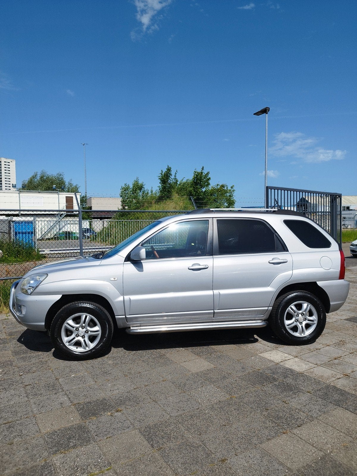 Kia Sportage 2.0 2WD nette auto, 1442 kg, Zwart, 4 cilinders, Leder en Stof