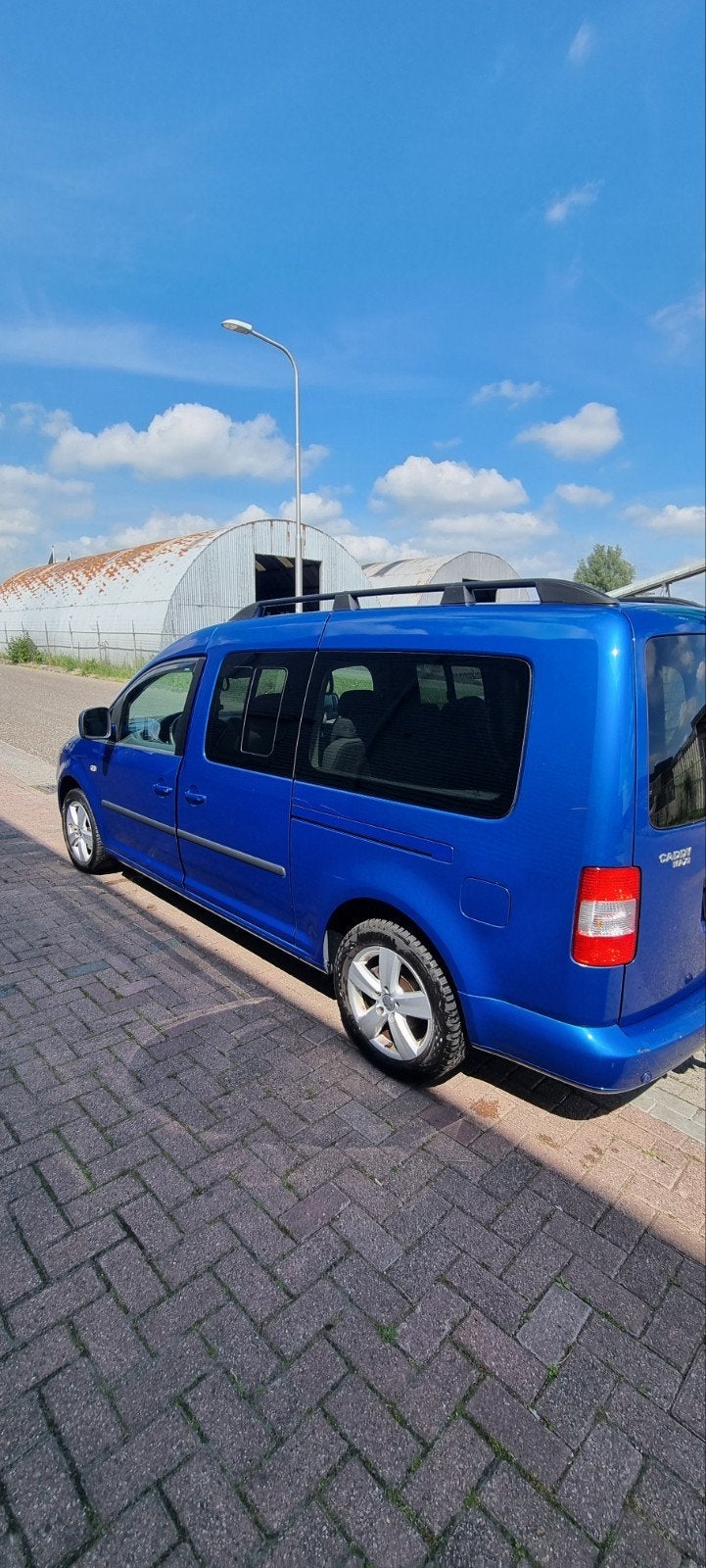 Volkswagen Caddy 1.6 75KW Maxi Combi 2009 Blauw, Auto's, Bestelauto's, Voorwielaandrijving, 4 cilinders, 7 stoelen, Handgeschakeld