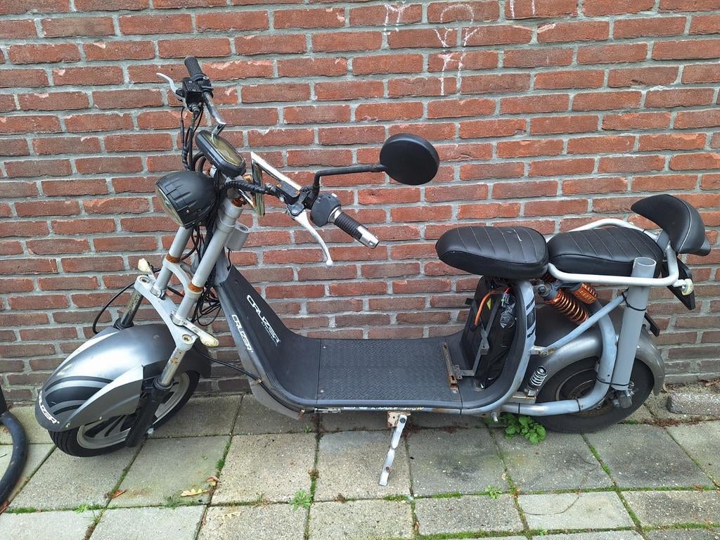 Cruzer elektrische scooter met 2 accu's, Ophalen, Gebruikt, 30 tot 50 km per accu, Overige merken