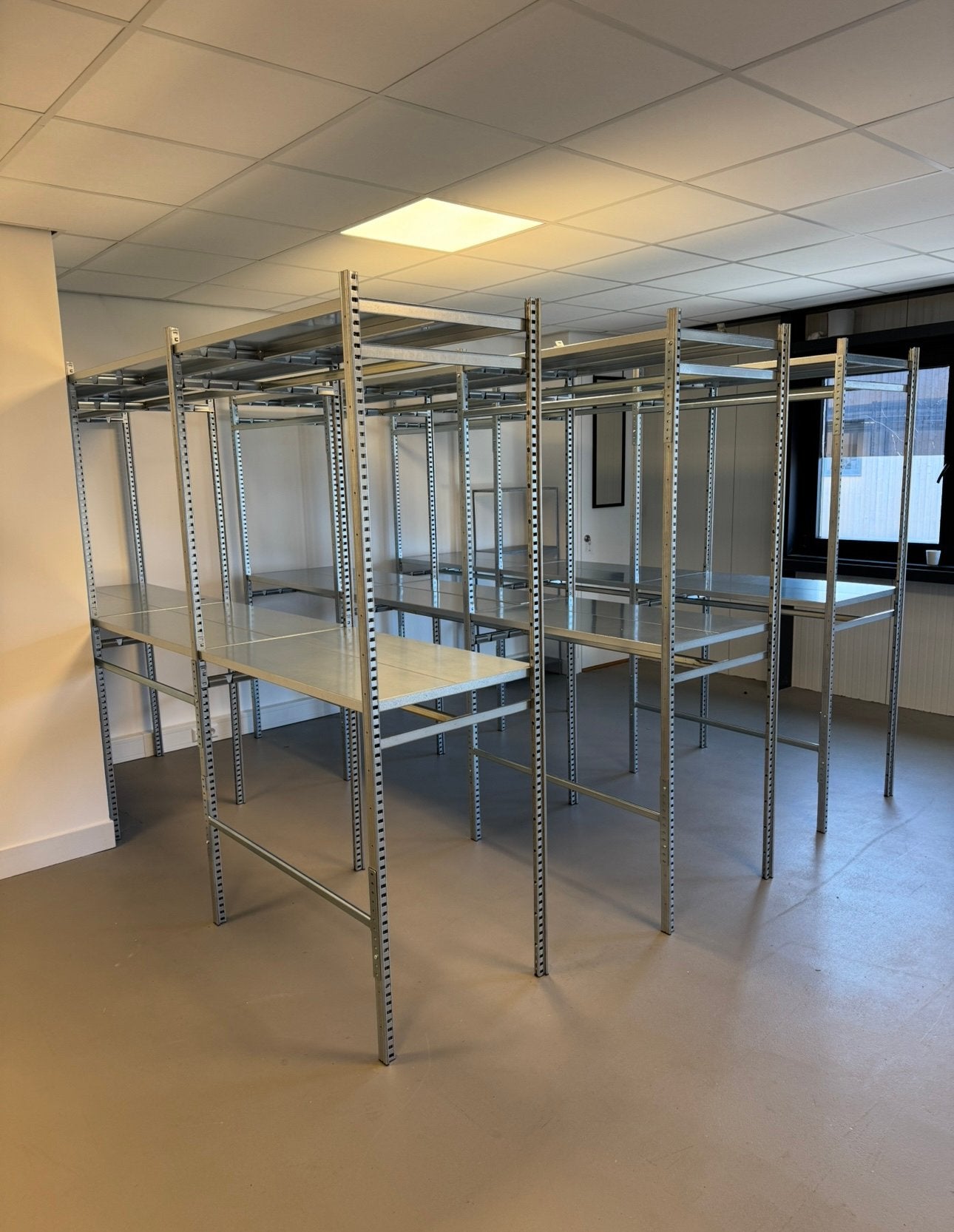 Confectie stellingen, magazijn stelling kleding, Ophalen