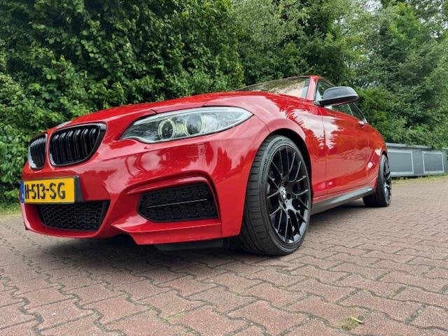 BMW 2 Serie Coupé M235i HIGH EXECUTIVE 400PK M-PERFORMANCE, Auto's, Achterwielaandrijving, Gebruikt, Euro 6, 4 stoelen