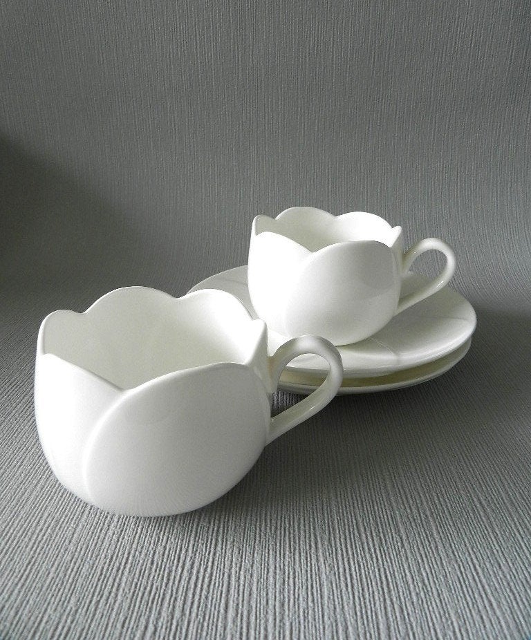 Officina Alessi TULIP Kop en schotels in Nieuwstaat!, Ophalen of Verzenden, Overige typen, Overige materialen, Gemerkt