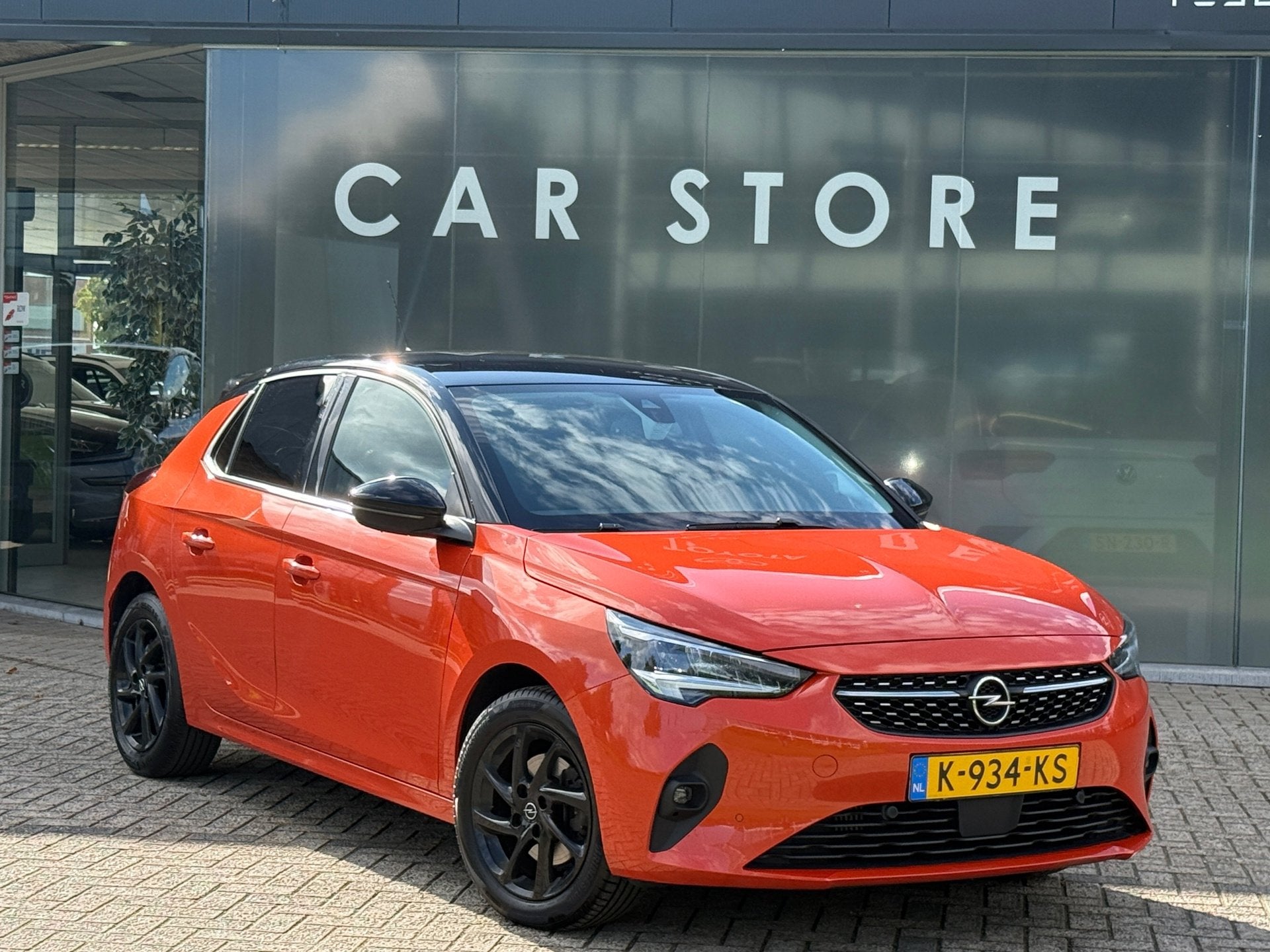 Opel Corsa 1.2 101pk Automaat Elegance Carplay|Camera|PDC|St, Dealer onderhouden, 101 pk, Gebruikt, Leder en Stof