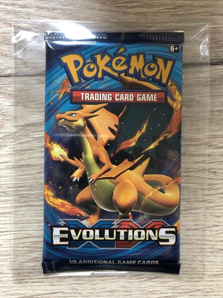 XY Evolutions boosterpack Pokemon - Charizard art - sealed!, Ophalen of Verzenden, Nieuw, Booster, Foil