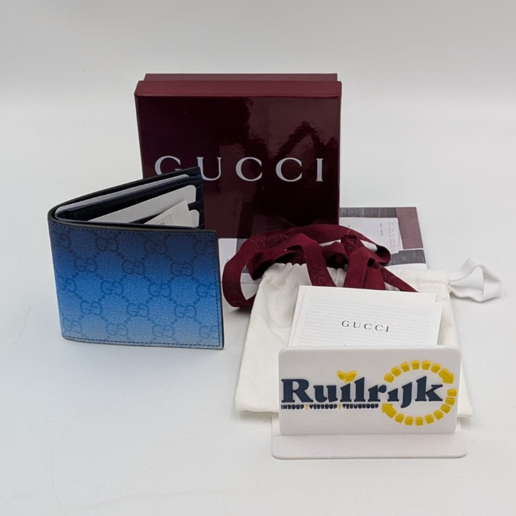 Gucci Chroma bi-fold portemonnee blauw - Nieuw met bon, Sieraden, Tassen en Uiterlijk, Gucci, Nieuw, Support@gucci.com, 30 Avenue Montaigne
75008 Paris