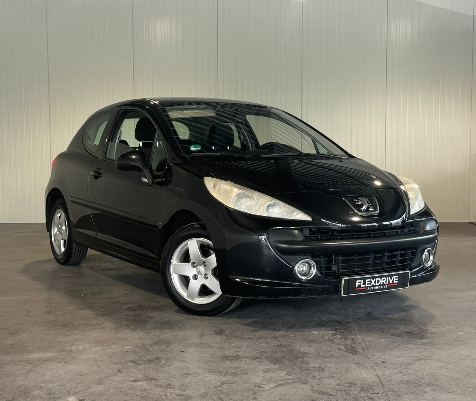 Peugeot 207 1.4 16V 3DRS 2006 Zwart, Auto's, Voorwielaandrijving, Stof, Zwart, 4 cilinders