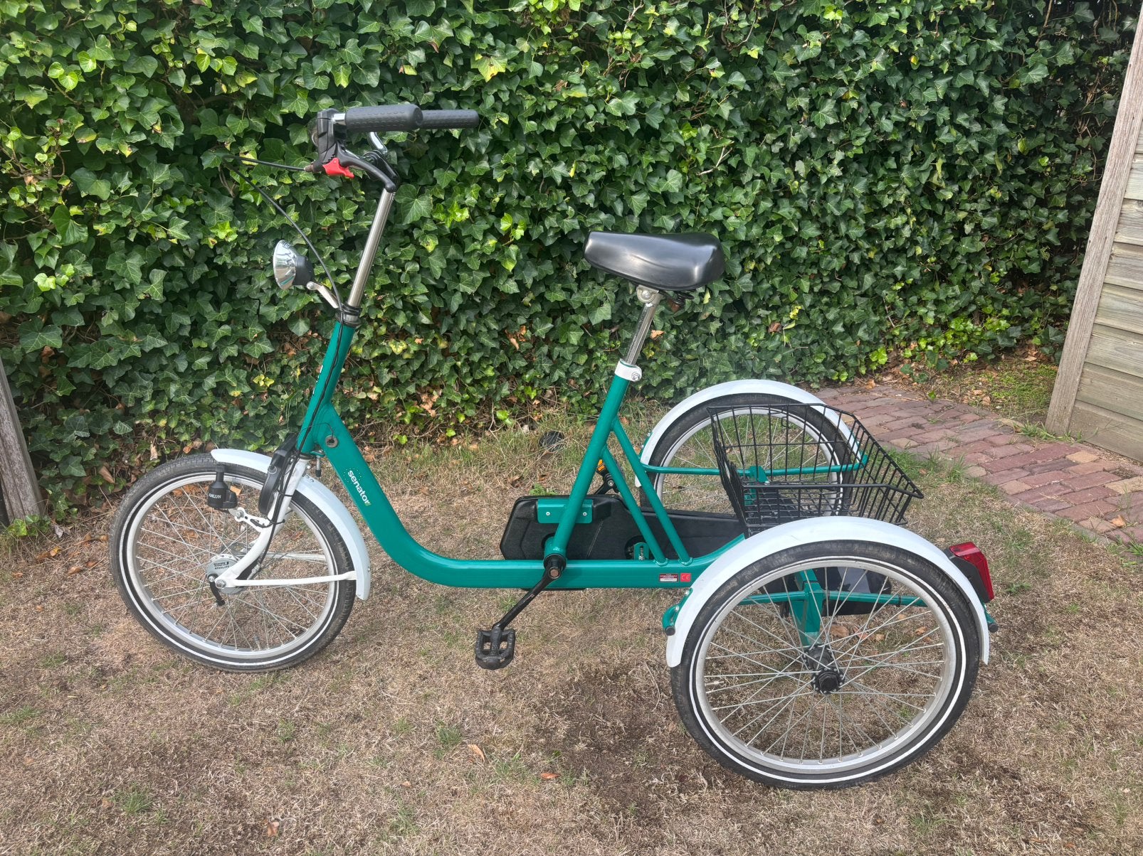 Driewieler, Ophalen, Zo goed als nieuw, Terugtraprem