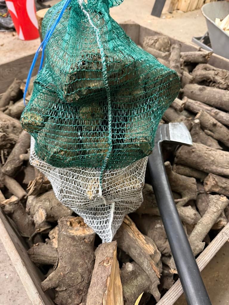 Perenhout stookhout kachelhout openhaardhout in netzakken, Tuin en Terras, Haardhout, Minder dan 3 m³, Ophalen of Verzenden