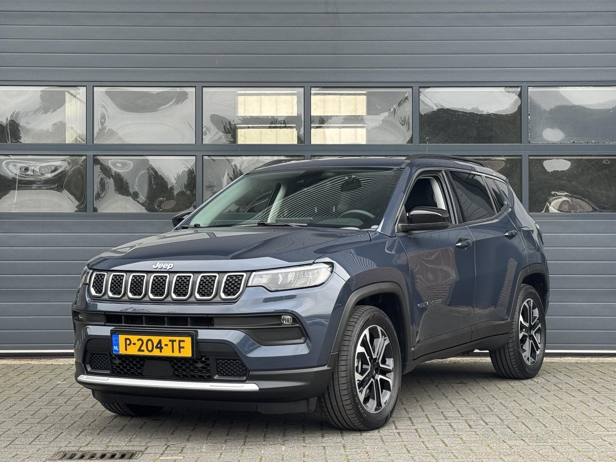 JEEP COMPASS 4xe 240 PLUG-IN HYBRID ELECTRIC LIMITED I WINTE, Auto's, Automaat, 4 cilinders, Met garantie (alle), Blauw