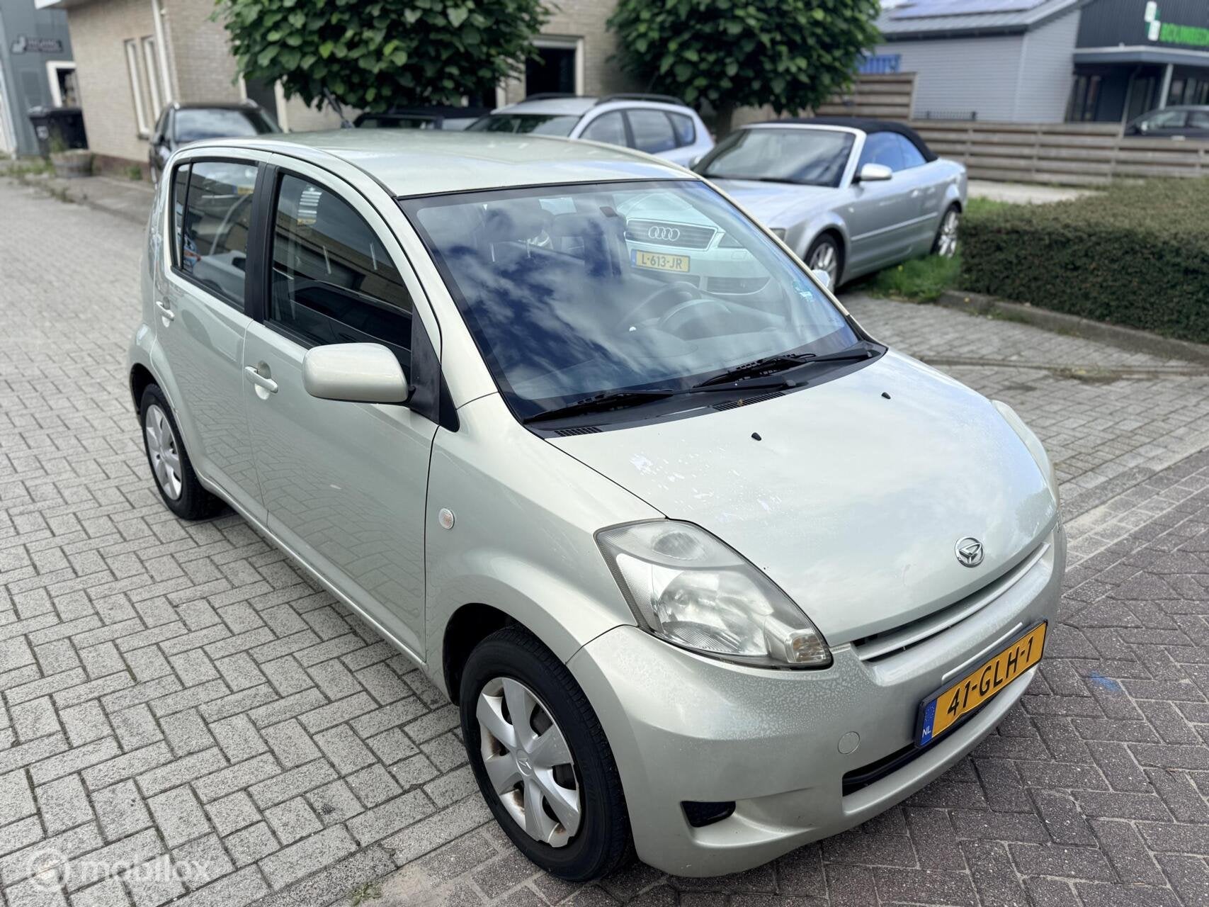 Daihatsu Sirion 2 1.0-12V Premium, Auto's, Voorwielaandrijving, Gebruikt, Elektrische ramen, Beige