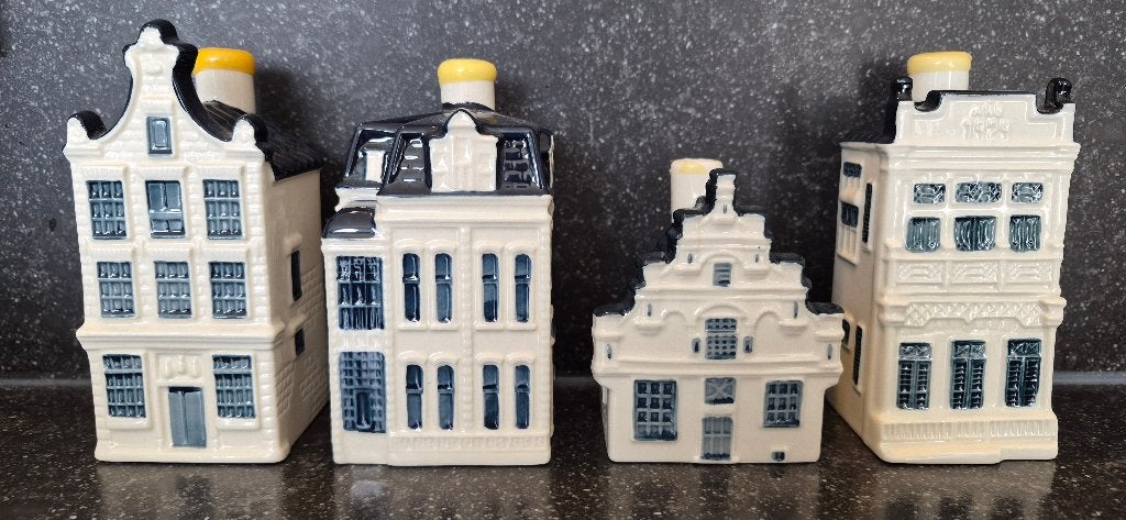 KLM huisjes 80, 91, 94 en 103, Verzamelen, Verzenden, Zo goed als nieuw, 81 t/m 91, Gevuld