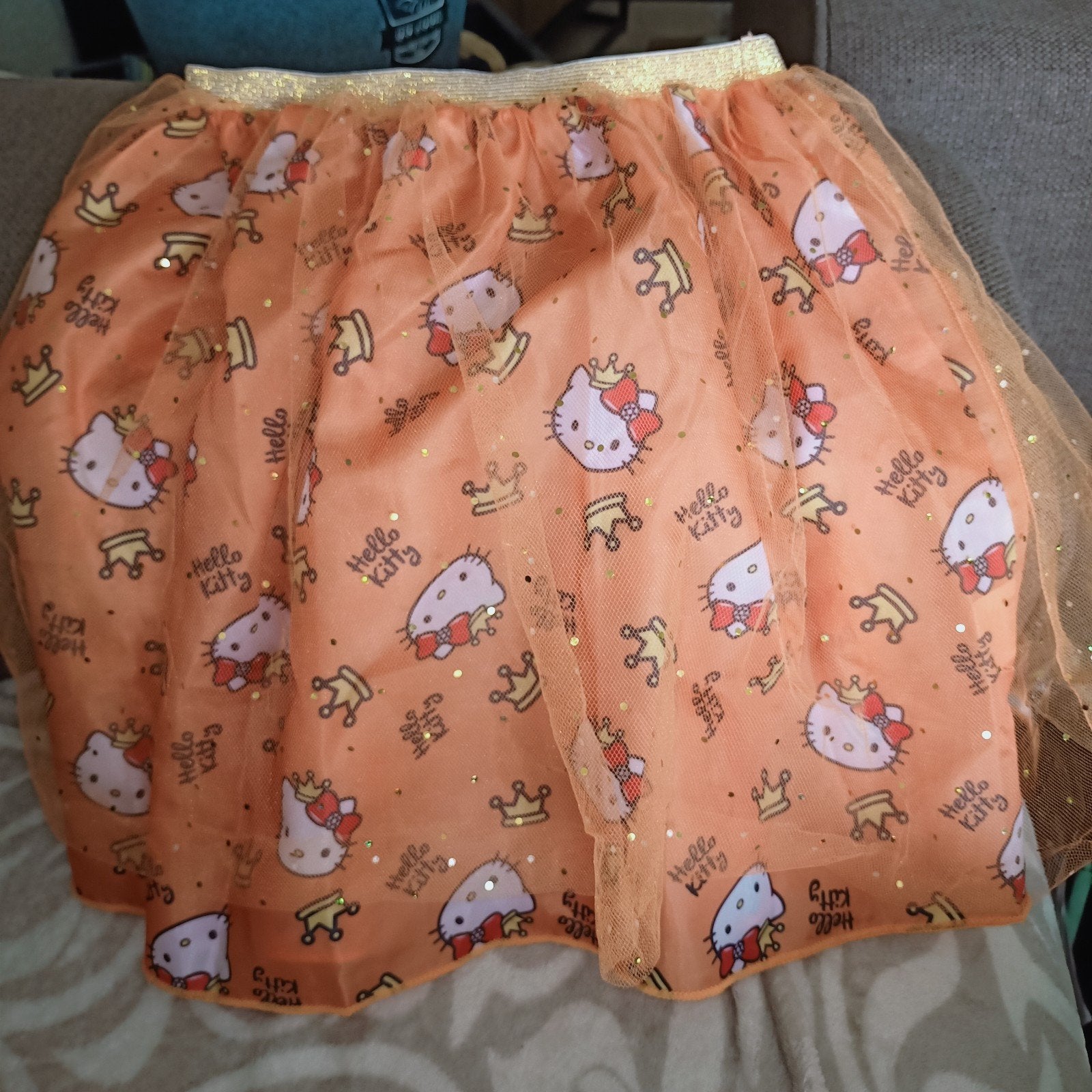 Hello kitty oranje rokje met tulle. 140/146. Nieuw, Meisje, Sanrio, Nieuw, Ophalen of Verzenden