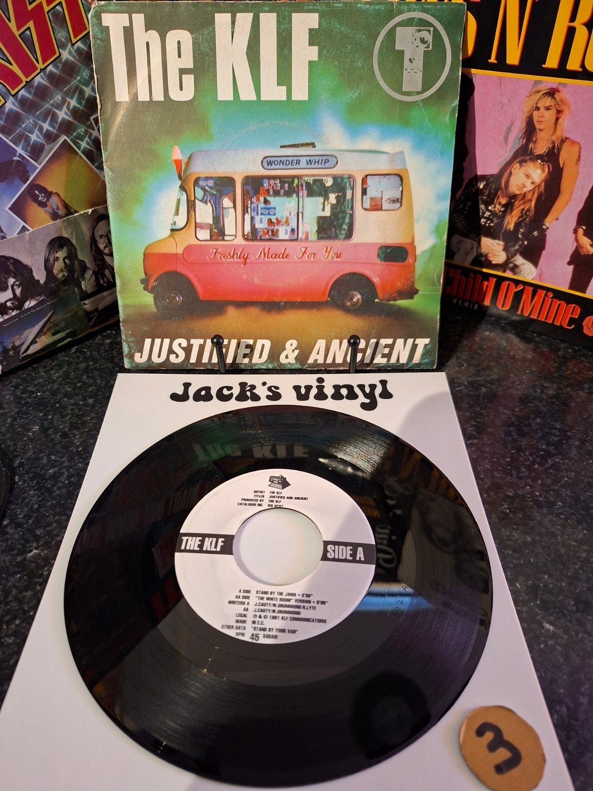 The KLF - Justified & Ancient 7 inch vinyl single 1991/3, Gebruikt, 7 inch, Ophalen of Verzenden, Fotohoes