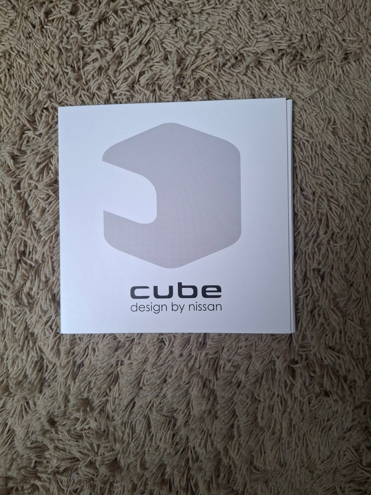 Autofolder Nissan Cube, Verzenden, Zo goed als nieuw, Nissan