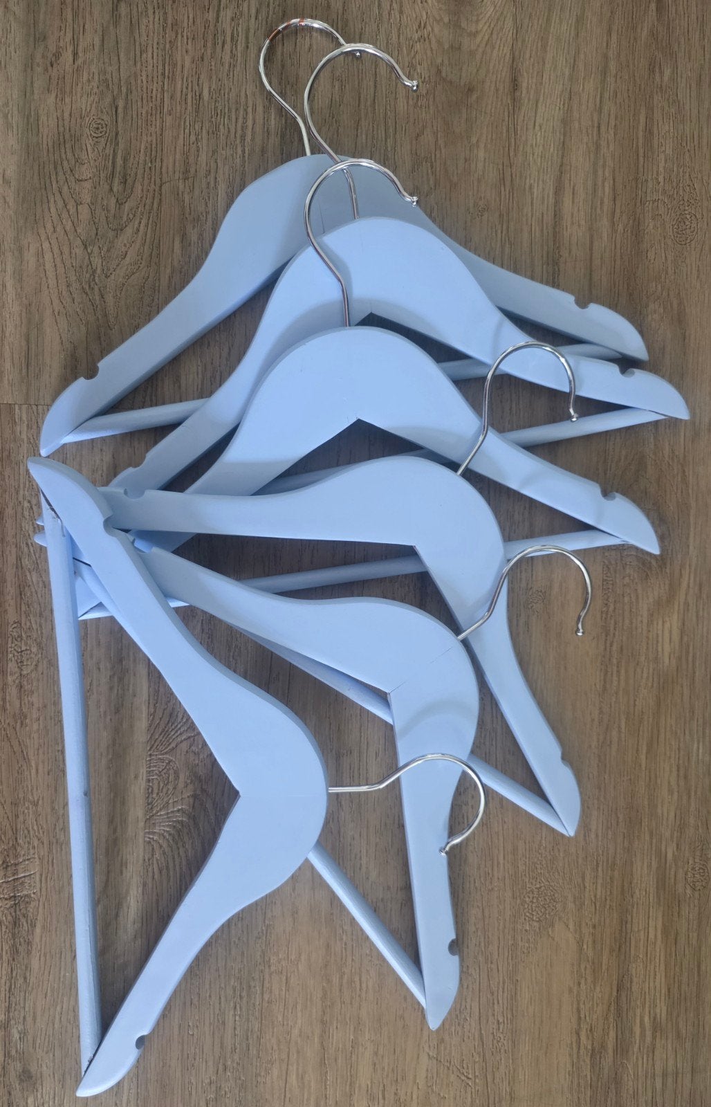 6 blauwe houten kledinghangers voor baby- en kinderkleding, Ophalen