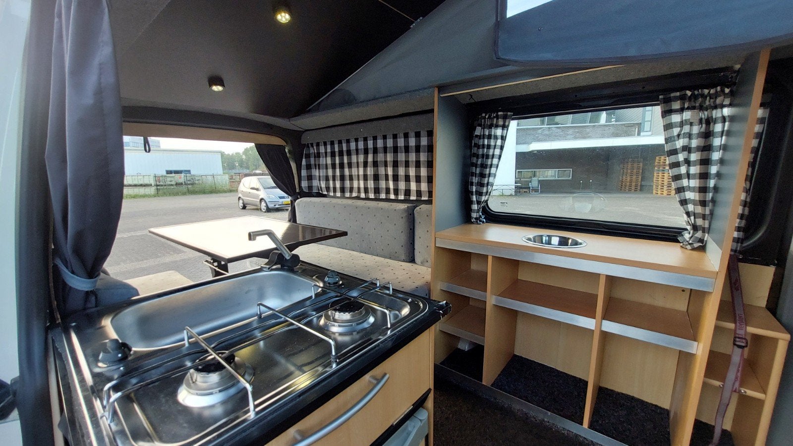 Foto 12 van VW T5 REIMO # 6 ZIT+4 SLAAPPLAATSEN # SLAAPHEFDAK #LENGTEZIT