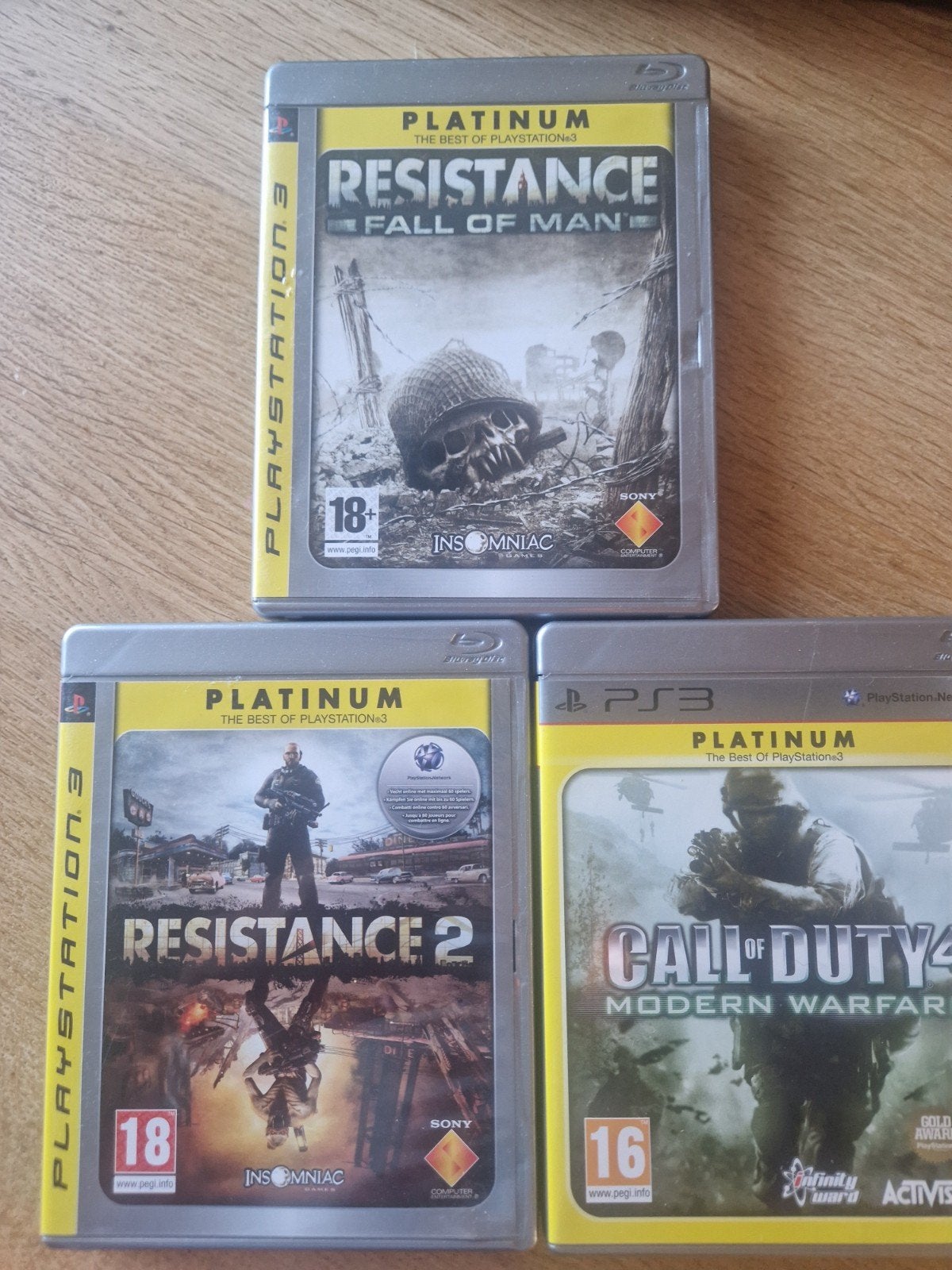 PS3 Platinum Games: Resistance 1 & 2, Call of Duty 4, Online, Gebruikt, Vanaf 18 jaar, Shooter