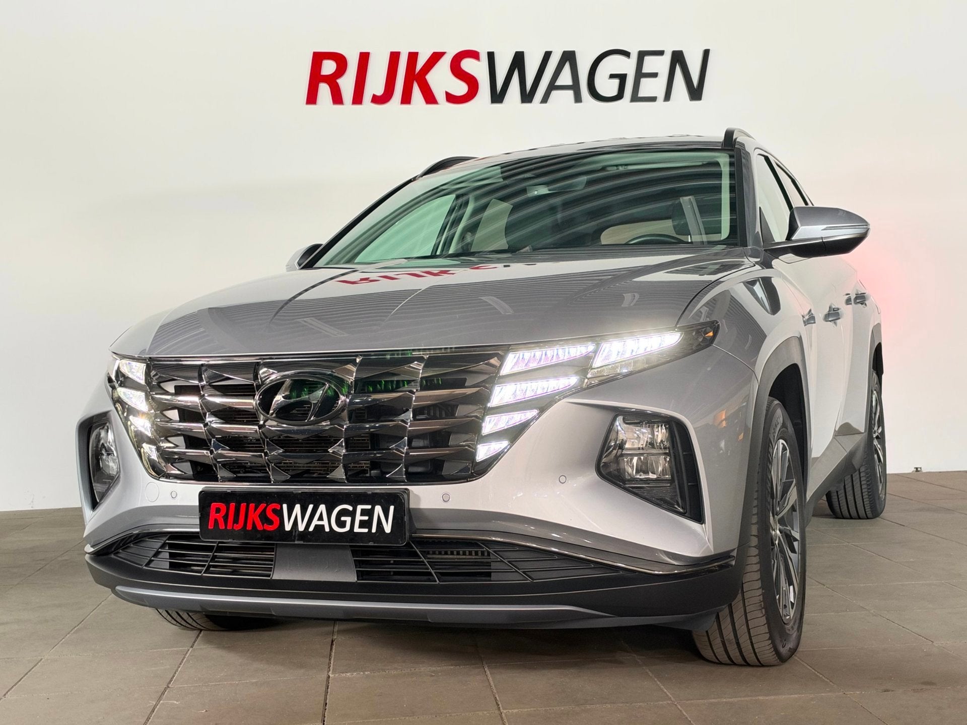 Hyundai Tucson 1.6 T-GDI HEV Comfort Smart ACC/Carplay/Keyle, Auto's, Dealer onderhouden, Stof, 4 cilinders, Met garantie (alle)