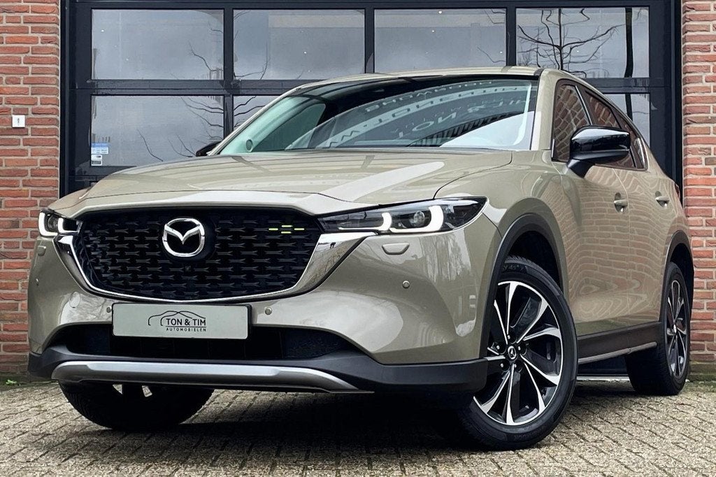 Mazda CX-5 2.5 SkyActiv-G 194 AWD Newground DealerAuto '22, Auto's, Mazda, Gebruikt, Zwart, 4 cilinders, 2000 kg