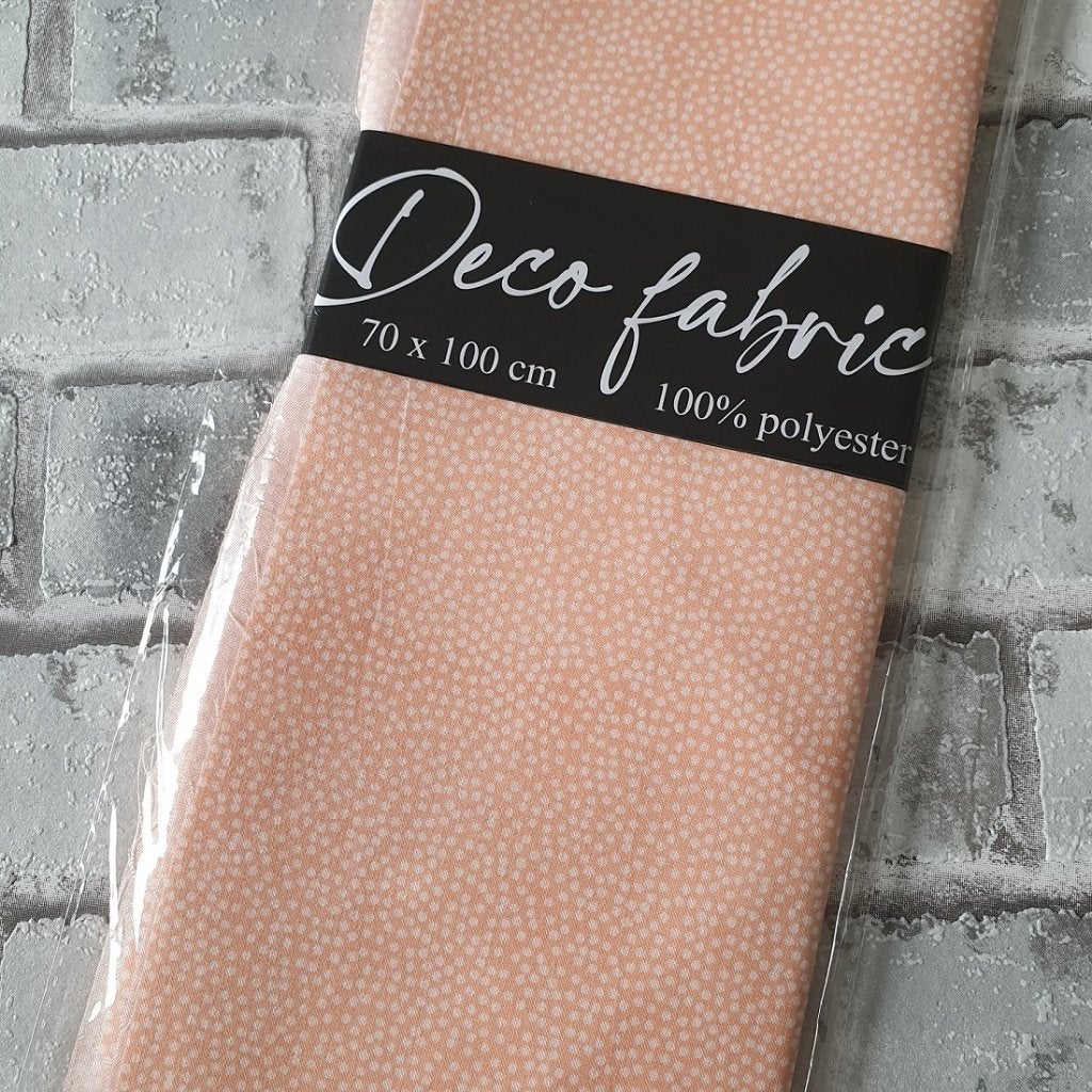 Deco stofje 100 x 70 cm Patroon zalmroze met stippen