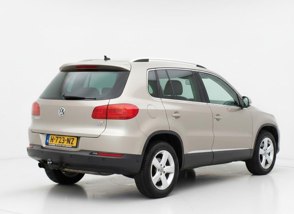Volkswagen Tiguan 1.4 TSI Sport&Style|Cruise|Trekhaak|PDC|BT, Auto's, Volkswagen, Voorwielaandrijving, Euro 5, 15 km/l, Gebruikt