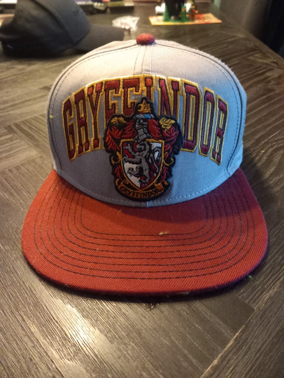 Harry Potter Gryffindor Snapback Pet, Consumer.products@warnerbros.com, Warner Bros. Entertainment Inc., 4000 Warner Blvd, Burbank, CA 91522, USA